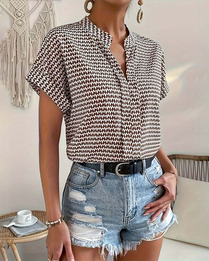 Haut élégant à manches courtes et col en V imprimé pied-de-poule